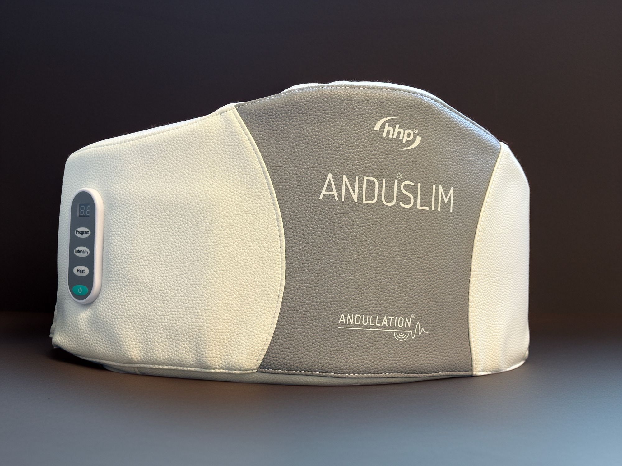 Anduslim_Andullation_Schmerztherapie_Bauchgurt_Massage_Front, Faszienrolle, Massagerolle, Elektrische Massage, Stütze, Grau